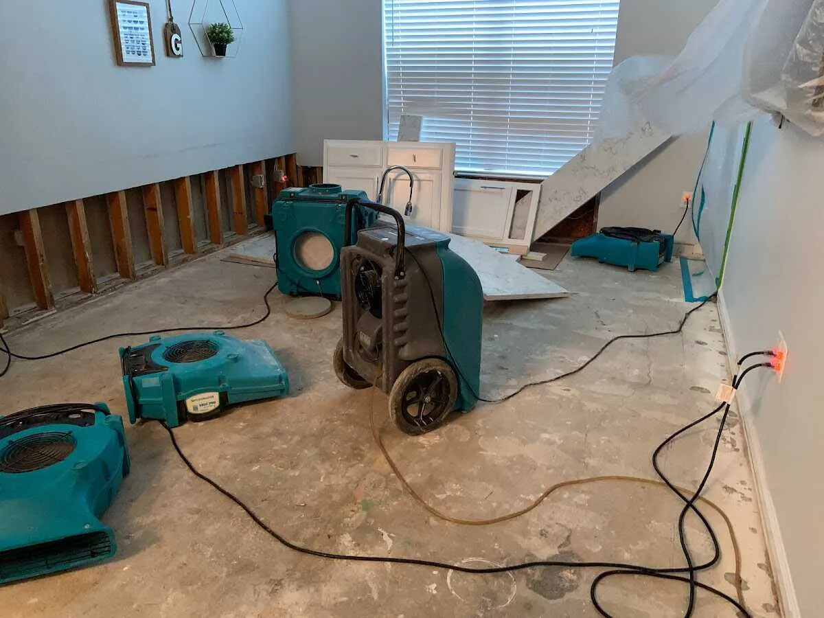 Dehumidifier in flood-cut room for Water Damage Restoration in Harper Woods